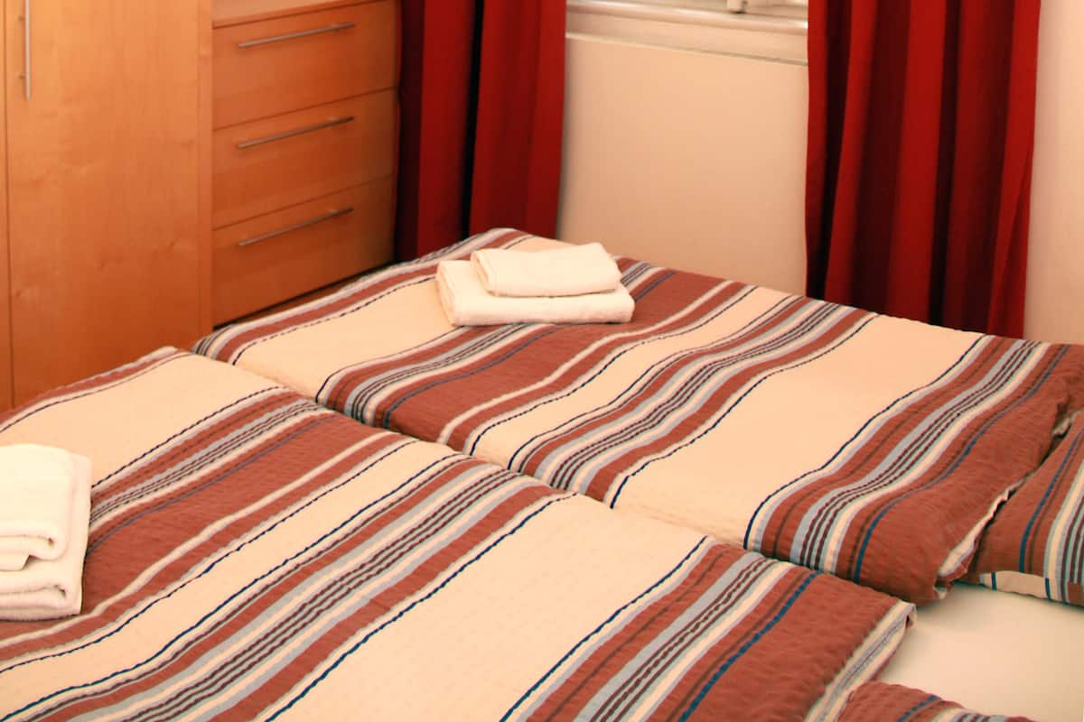 Iron/ironing board, free WiFi, bed sheets