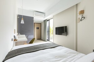 Double Room with Balcony (Balcony size/direction slightly different) | 1 bedroom, premium bedding, down comforters, blackout drapes