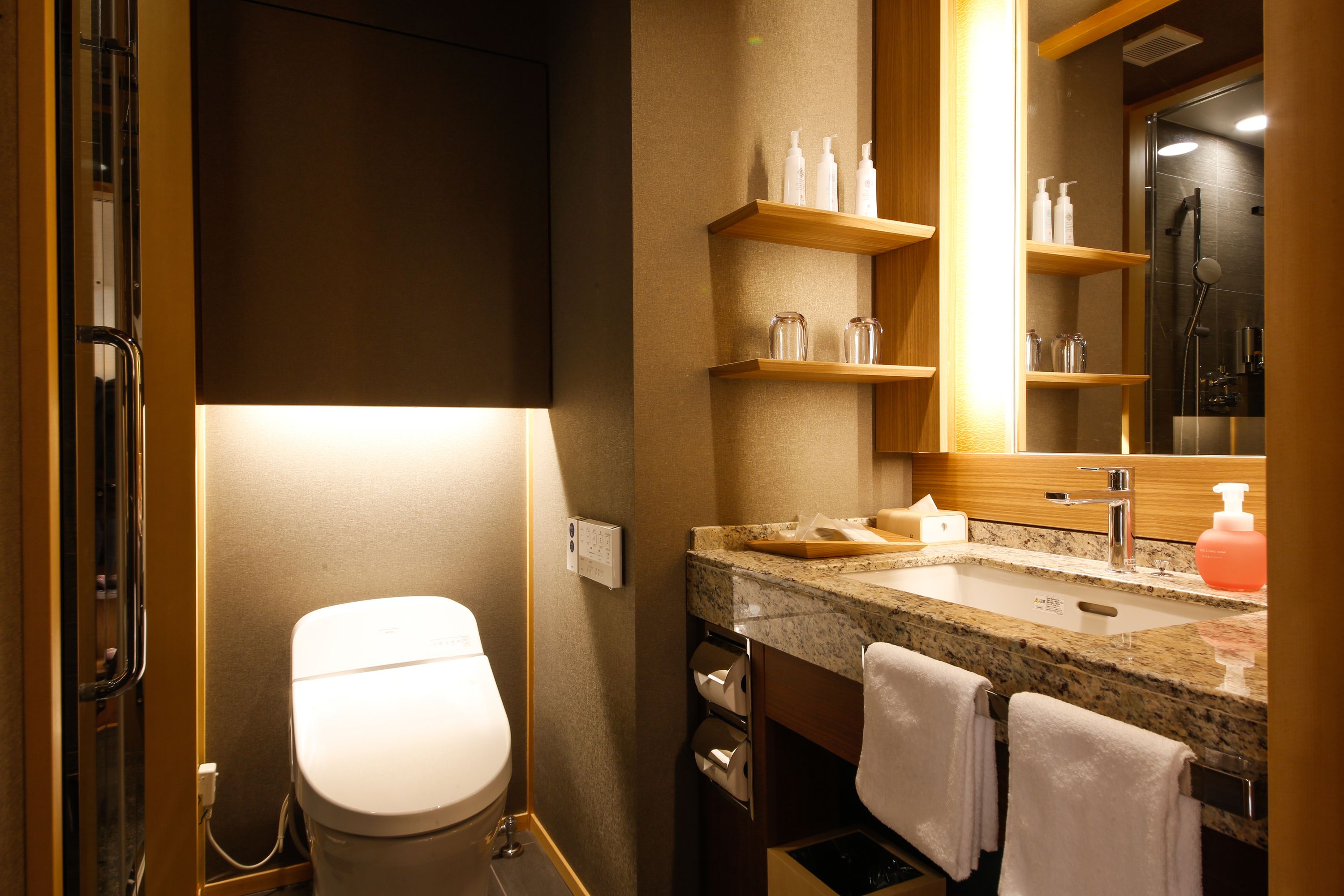 free toiletries, hair dryer, electronic bidet, towels