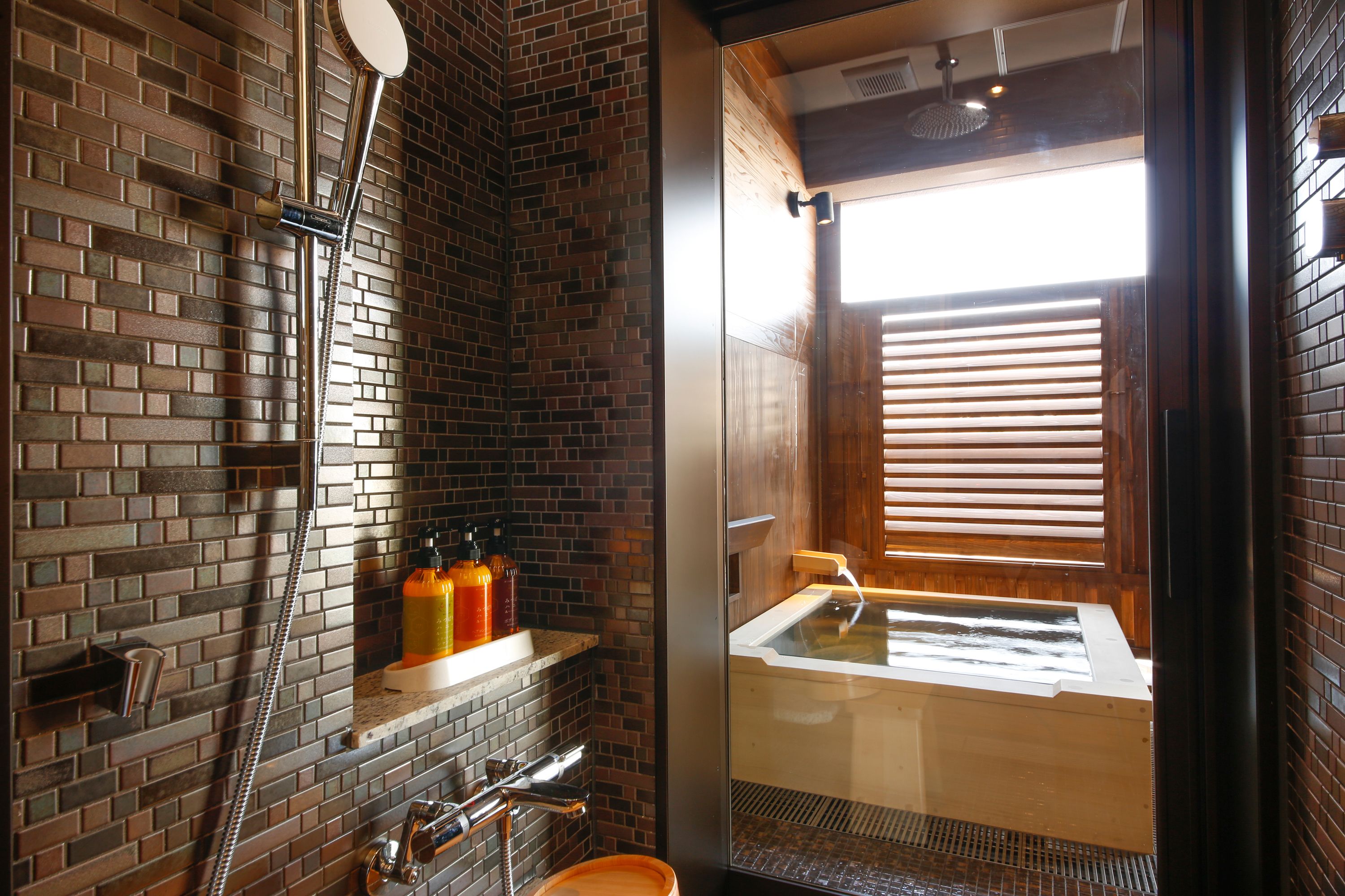 "yuro" club level twin room with private open-air bath | bathroom | free toiletries, hair dryer, electronic bidet, towels