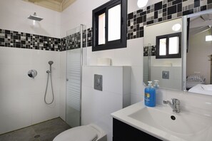 Deluxe Double Room, Multiple Beds, Non Smoking | Bathroom | Separate tub and shower, deep soaking tub, free toiletries, bathrobes