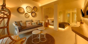 Luxury Suite, Hot Tub, Sea View | Living room | 50-inch Smart TV with satellite channels, TV, streaming services