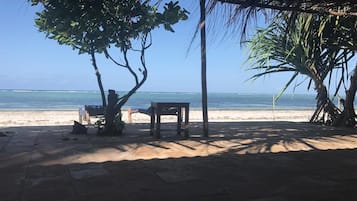 On the beach, sun loungers, beach umbrellas, scuba diving