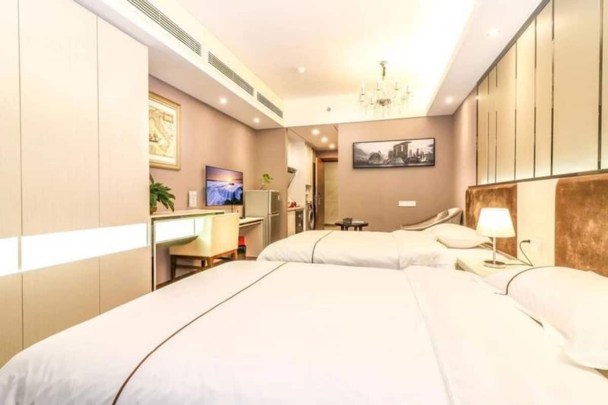 deluxe twin room, garden view | desk, blackout curtains, free wifi, bed sheets