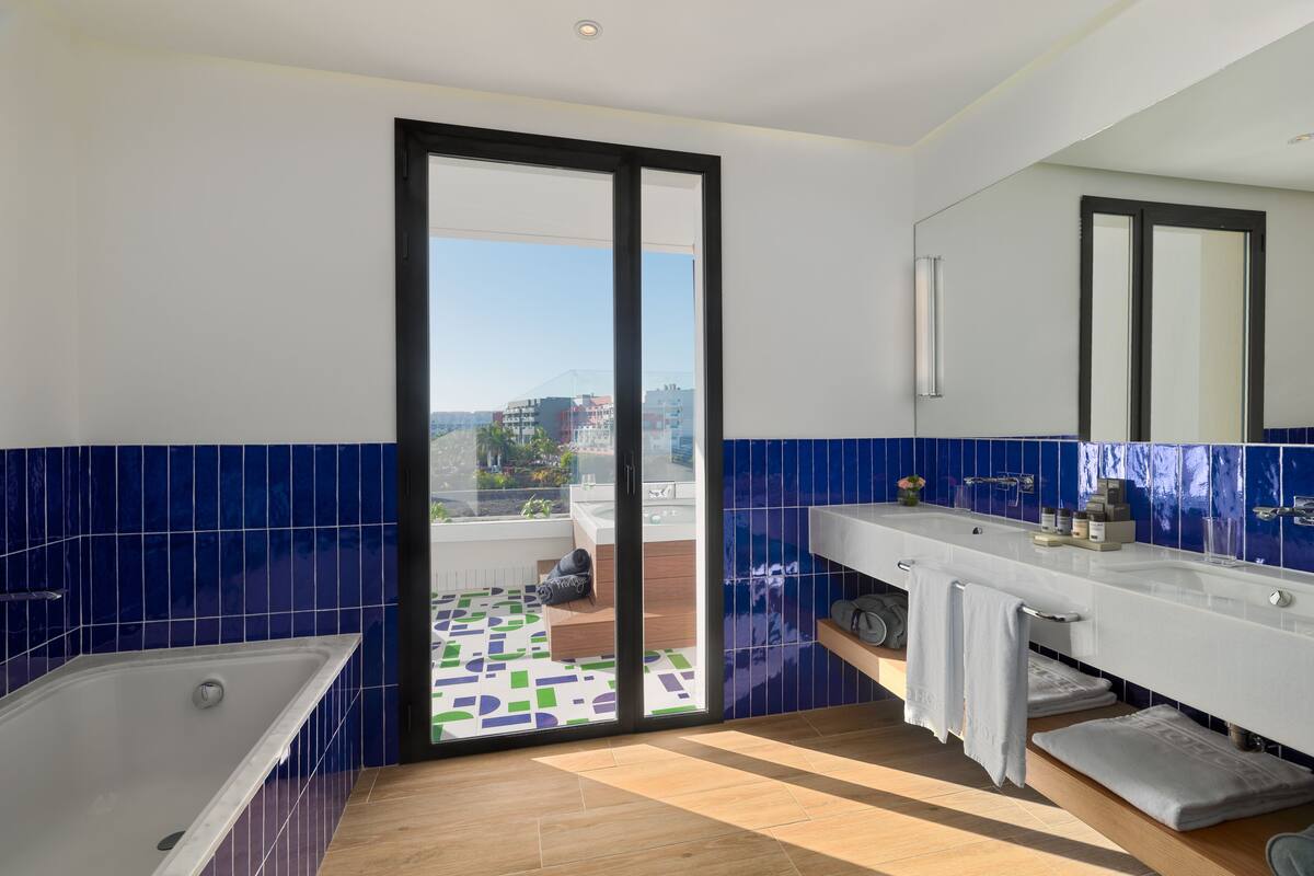 suite (privilege) | bathroom | shower, rainfall showerhead, free toiletries, hair dryer