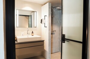 Suite, 1 King Bed | Bathroom | Shower, hair dryer, towels, soap