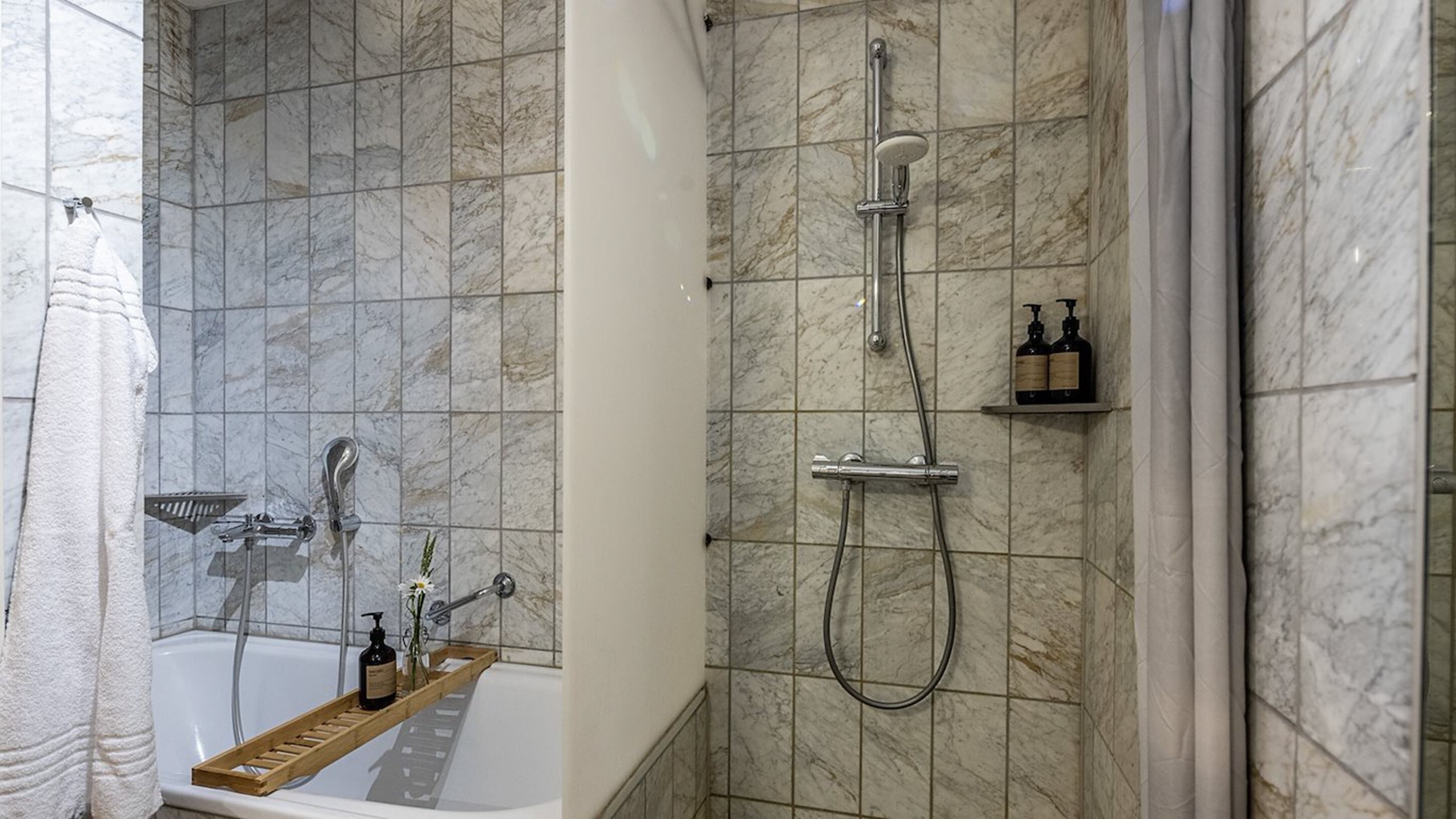 shower, free toiletries, hair dryer, towels