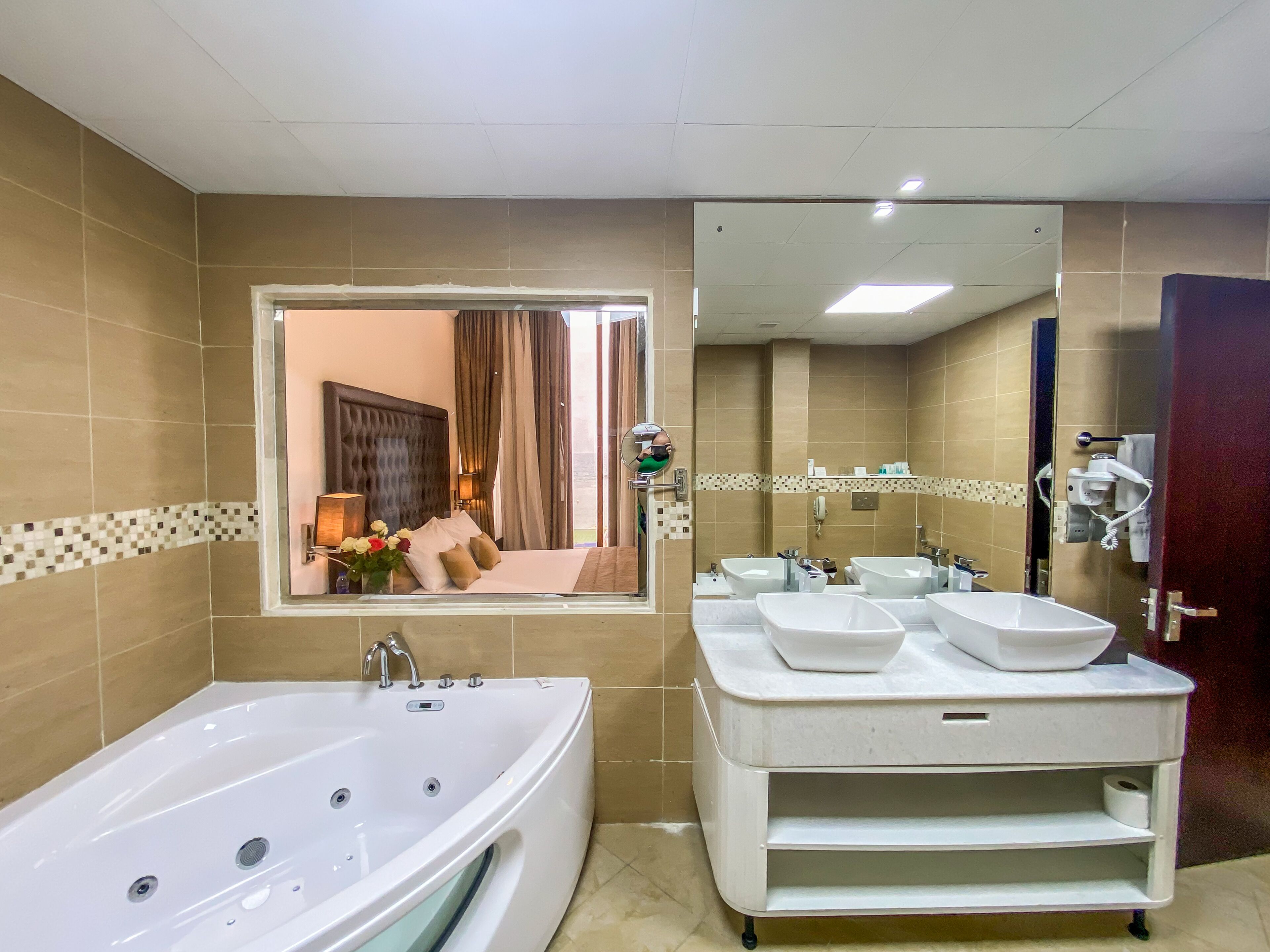 presidential villa | bathroom | shower, hair dryer, bidet, towels