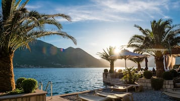 Private beach, sun loungers, beach umbrellas, beach towels