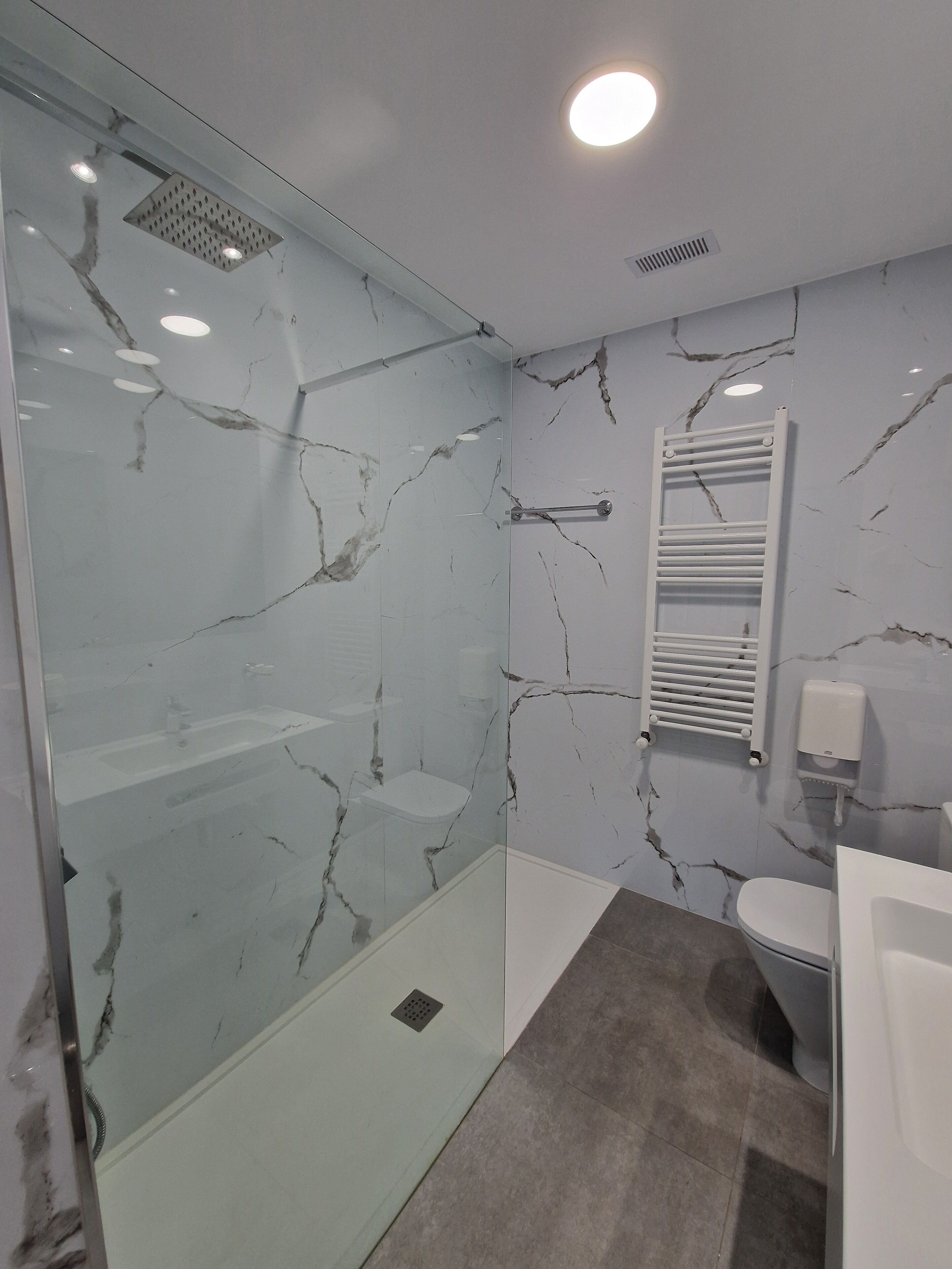 comfort room | bathroom | hair dryer, towels, soap, shampoo