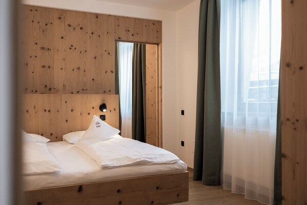 Family Room | 2 bedrooms, premium bedding, down duvets, minibar - Family Resort Rainer (Sesto)