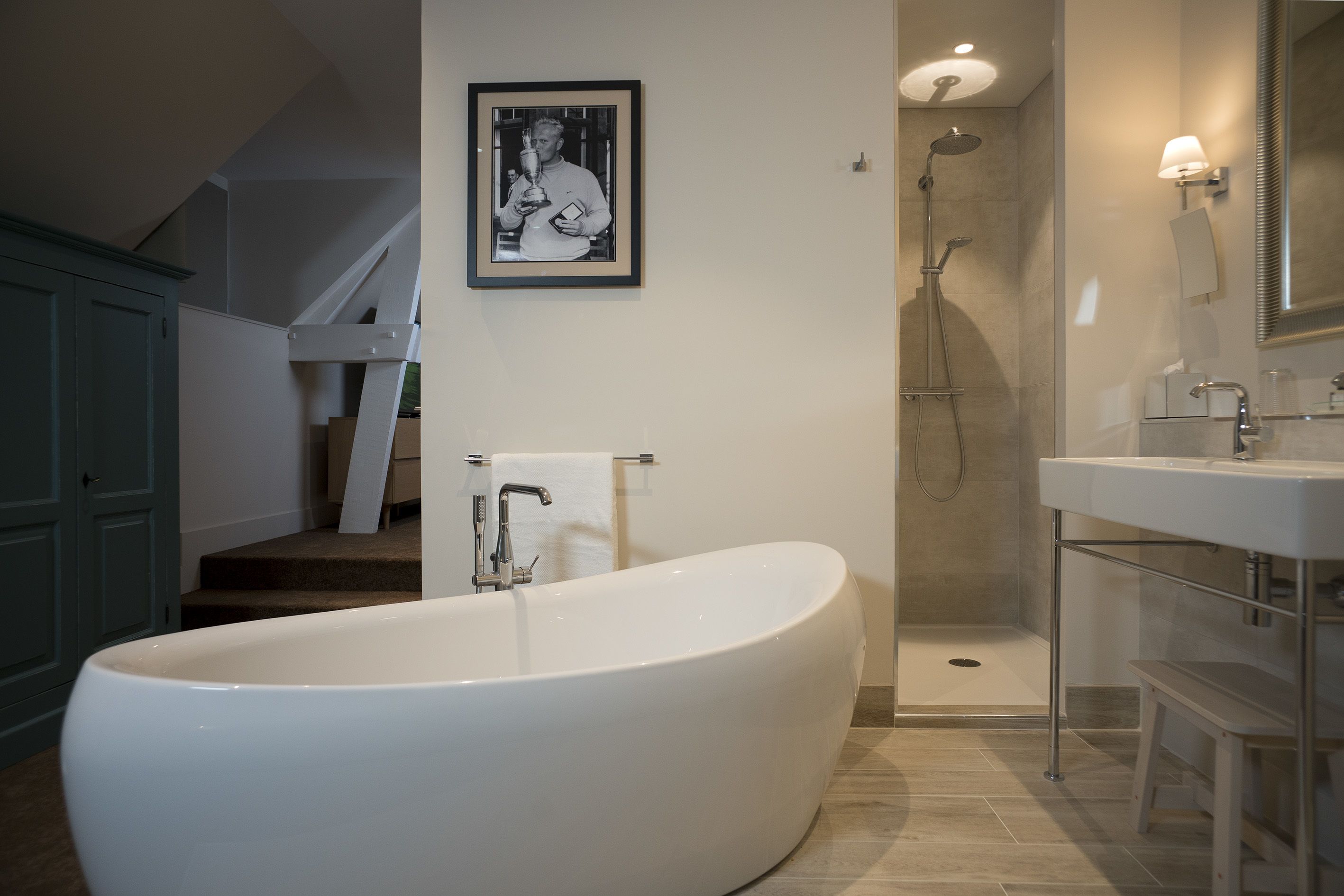 combined shower/bathtub, free toiletries, hair dryer, towels