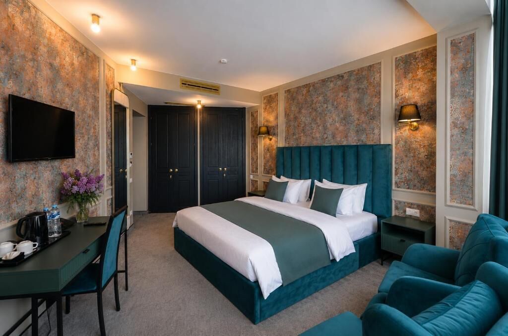 In-room safe, desk, laptop workspace, iron/ironing board