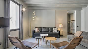 Apartment, 2 Bedrooms | Living room | Flat-screen TV