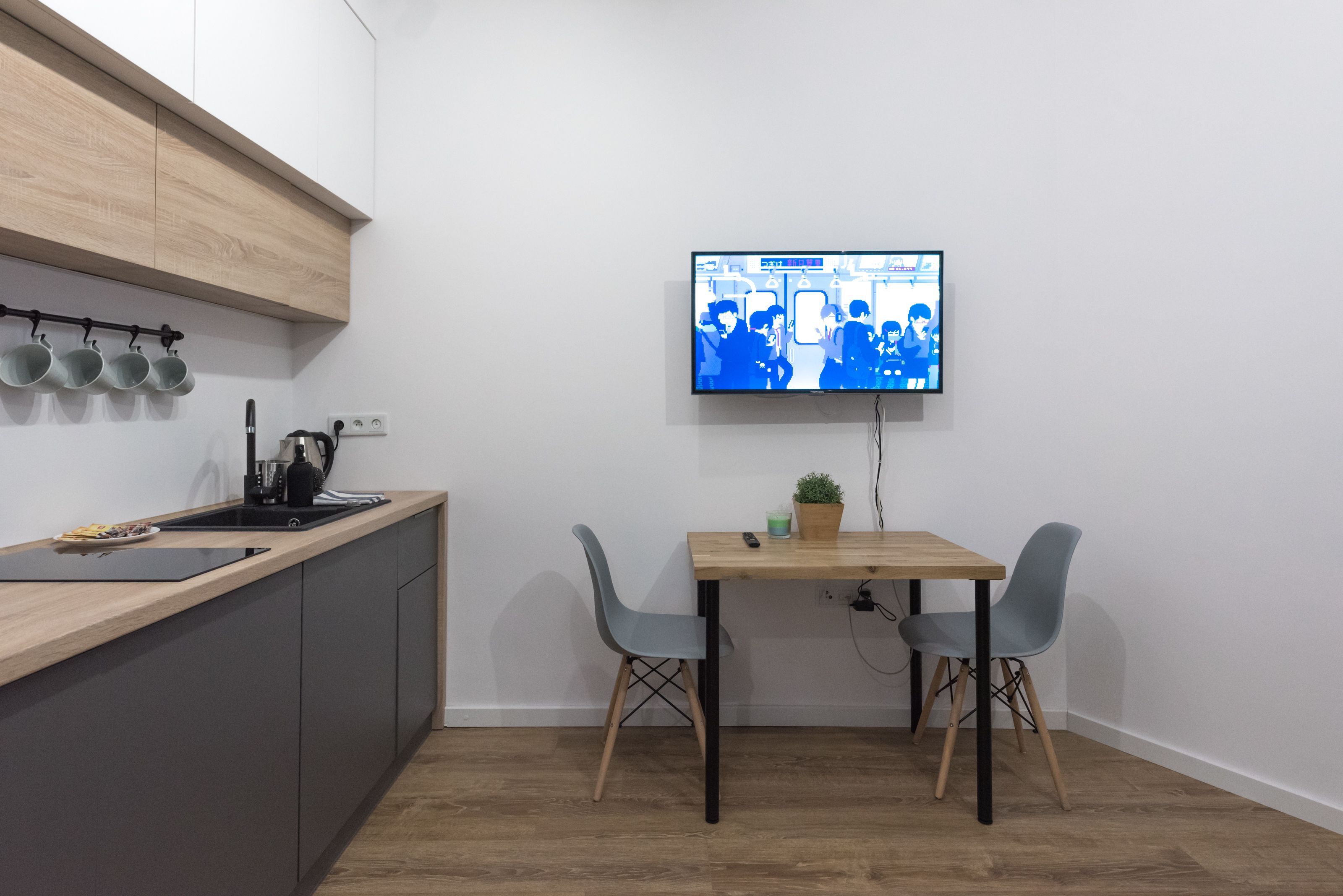 design studio suite, 1 queen bed, non smoking | private kitchen | fridge, stovetop, electric kettle, cookware/dishes/utensils