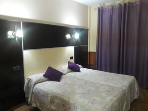 Egyptian cotton sheets, premium bedding, down comforters, minibar