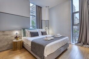 Studio Suite, 1 Bedroom, City View | Premium bedding, Tempur-Pedic beds, in-room safe, blackout curtains