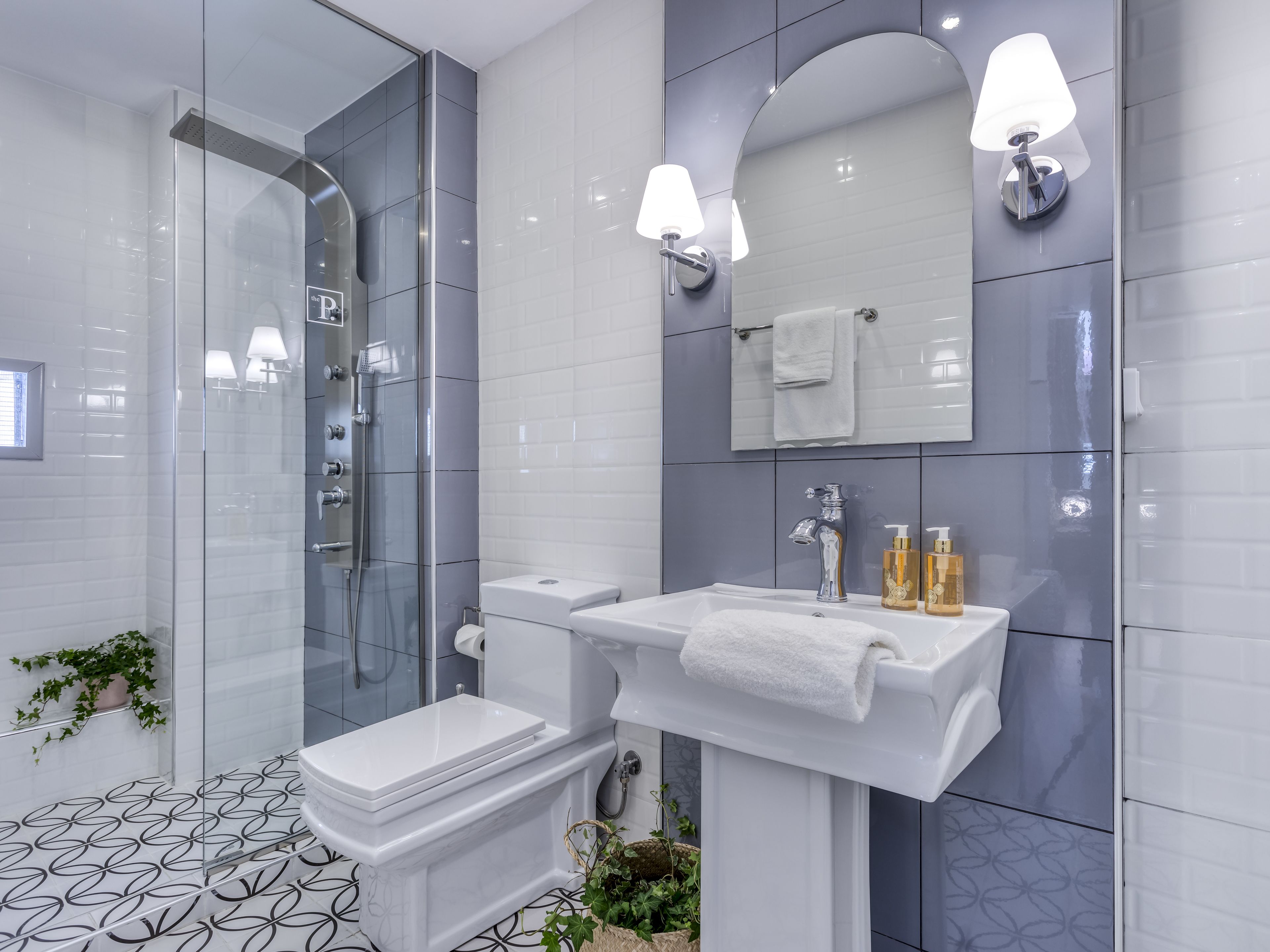superior suite | bathroom | shower, hydromassage showerhead, designer toiletries, hair dryer