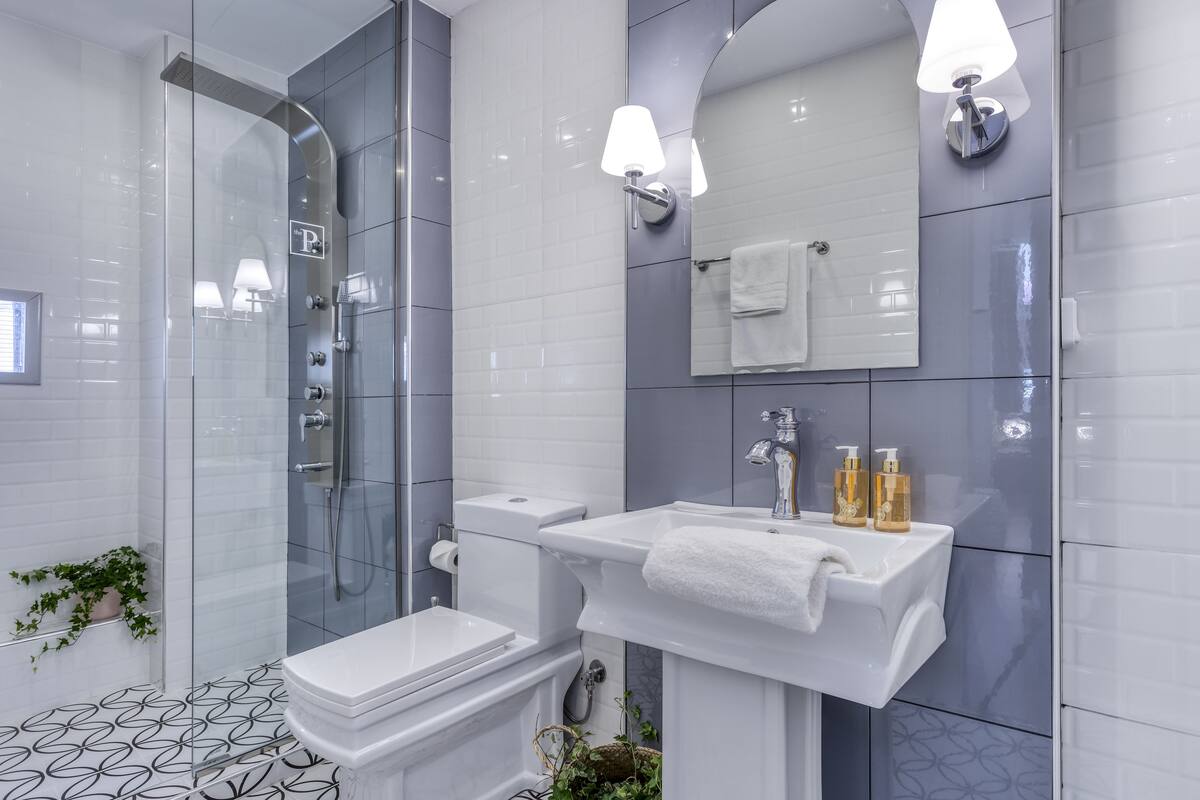 superior suite | bathroom | shower, hydromassage showerhead, designer toiletries, hair dryer