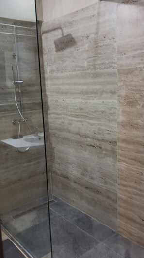 Bathtub, hair dryer, towels