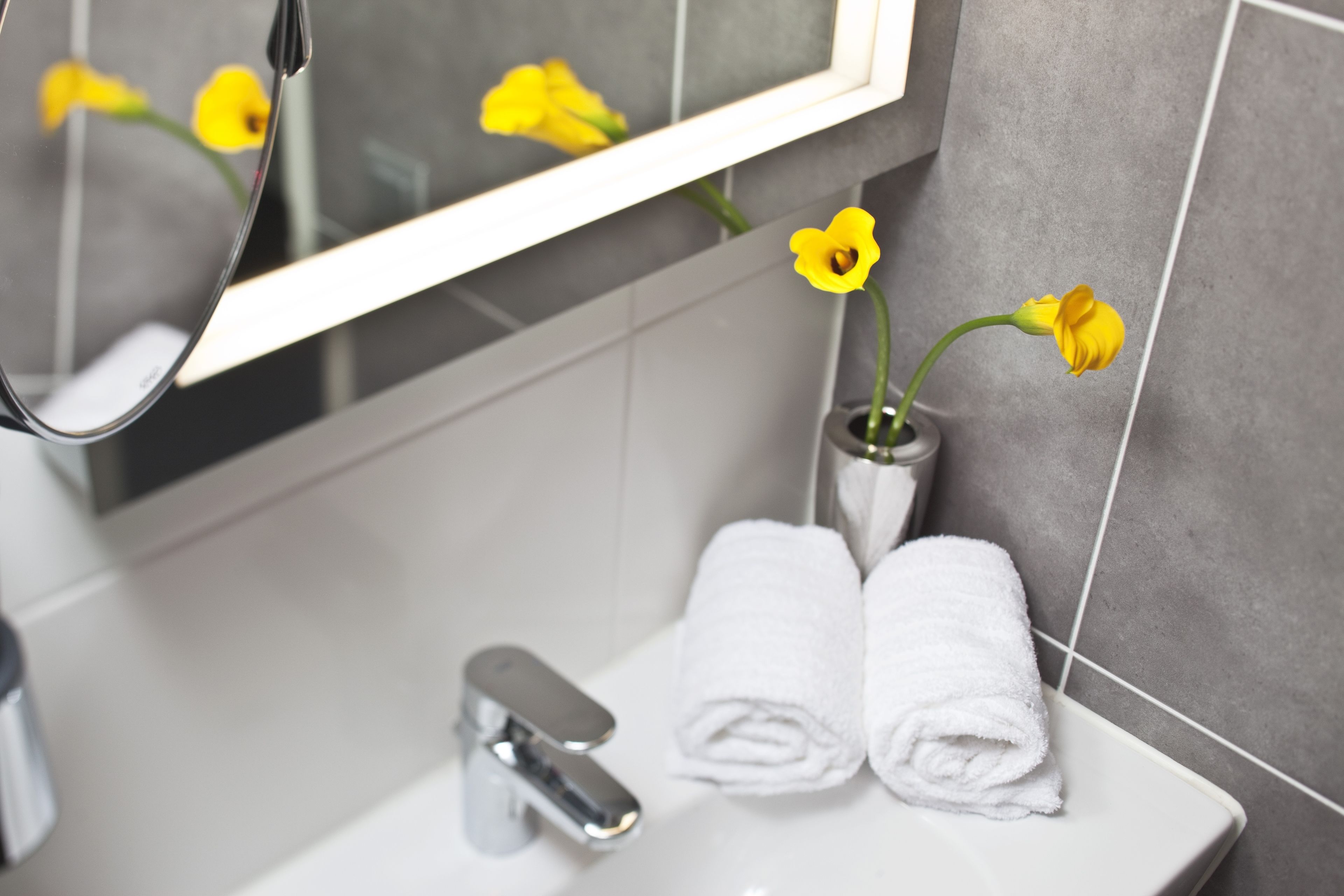 shower, eco-friendly toiletries, hair dryer, towels