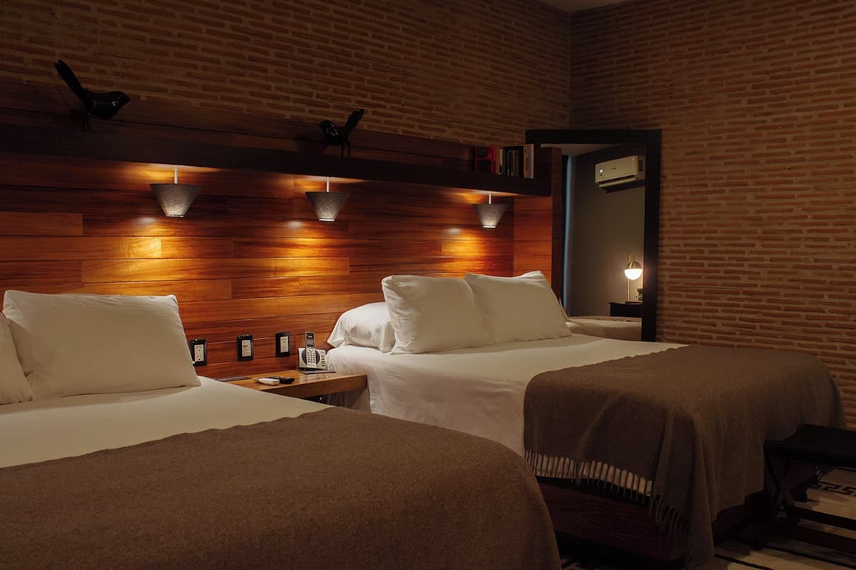 Premium bedding, down duvets, pillow-top beds, in-room safe