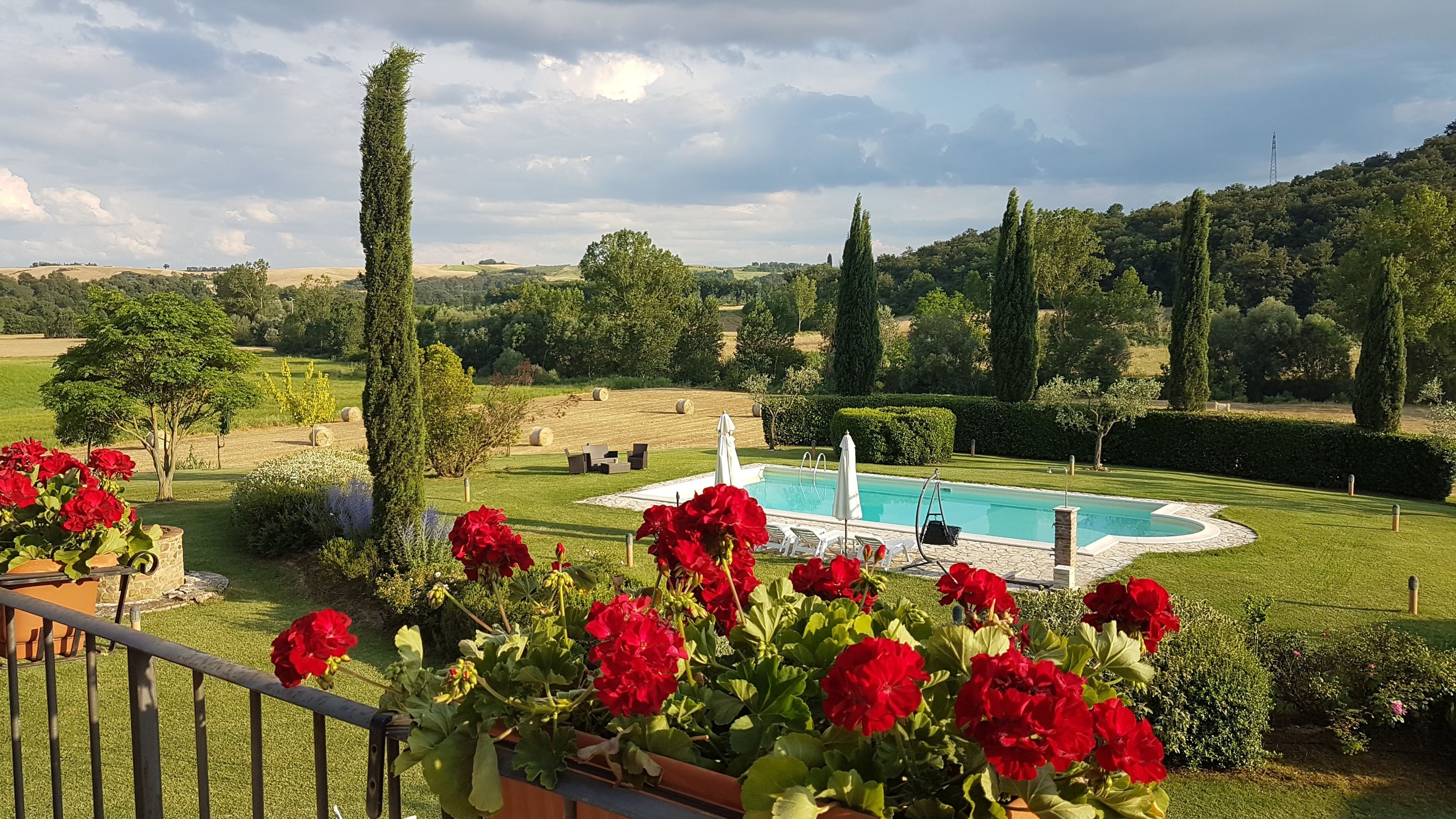 Seasonal outdoor pool, pool umbrellas, pool loungers