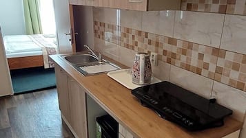 Suíte estúdio standard | Cofres nos quartos, cortinas blackout, Wi-Fi de cortesia, roupa de cama