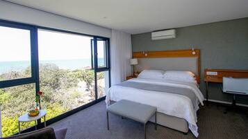 Luxury Room, Ocean View, Ground Floor | Premium bedding, pillow-top beds, minibar, in-room safe