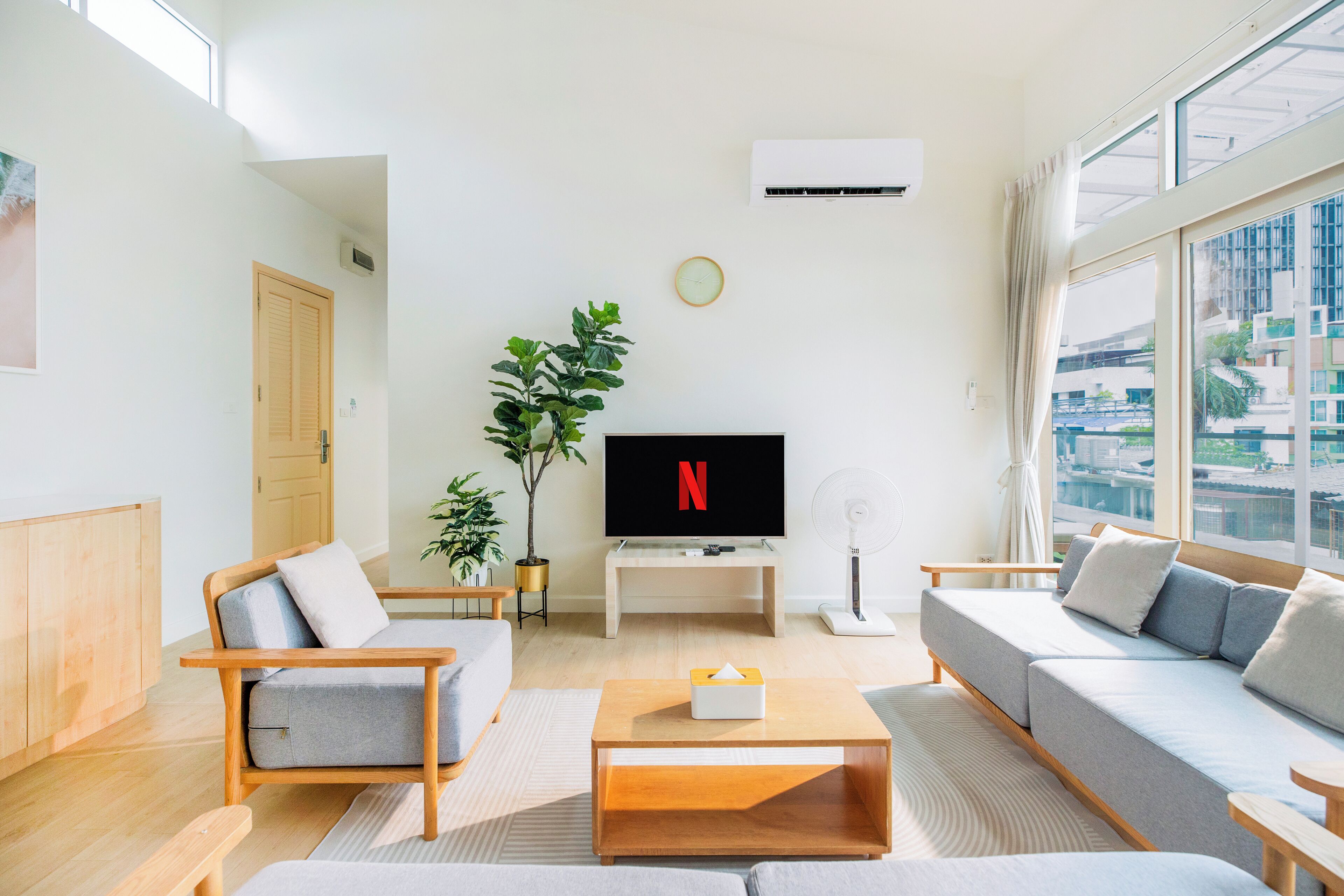 3 bedrooms rooftop penthouse | living area | 50-inch led tv with satellite channels, tv, fireplace