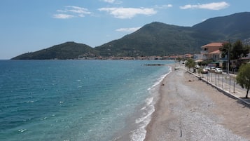 On the beach, free beach cabanas, sun-loungers, beach umbrellas