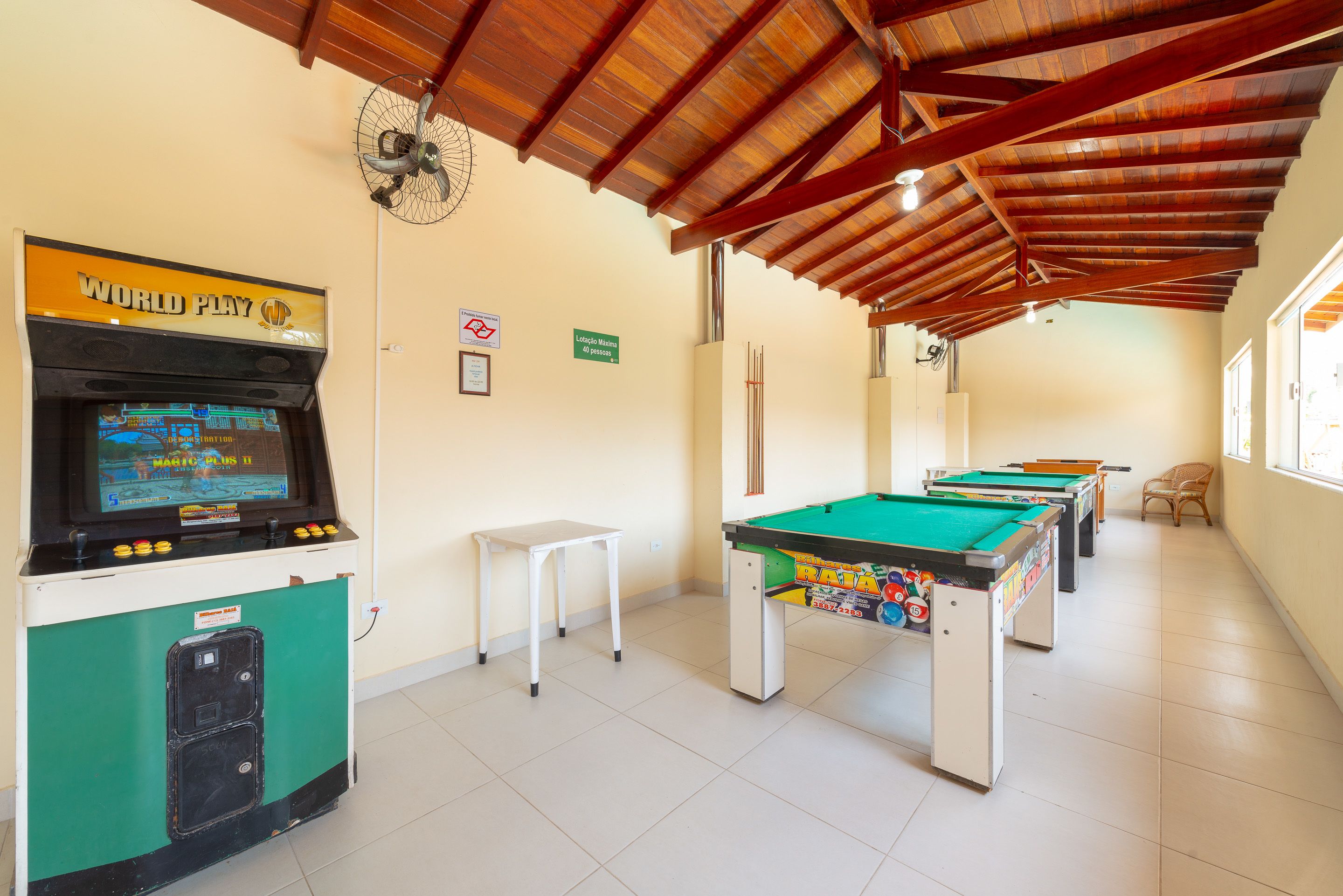 A pool table area with a pool table, a pool table, a pool table, a pool table, and a pool table.