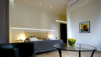 Premium bedding, down duvets, in-room safe, desk