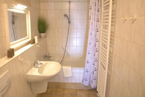 Bathtub, hair dryer, soap
