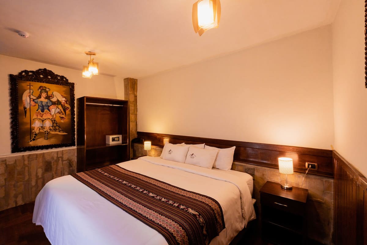 Chambre Deluxe, 1 grand lit | Accès au Wi-Fi (inclus)