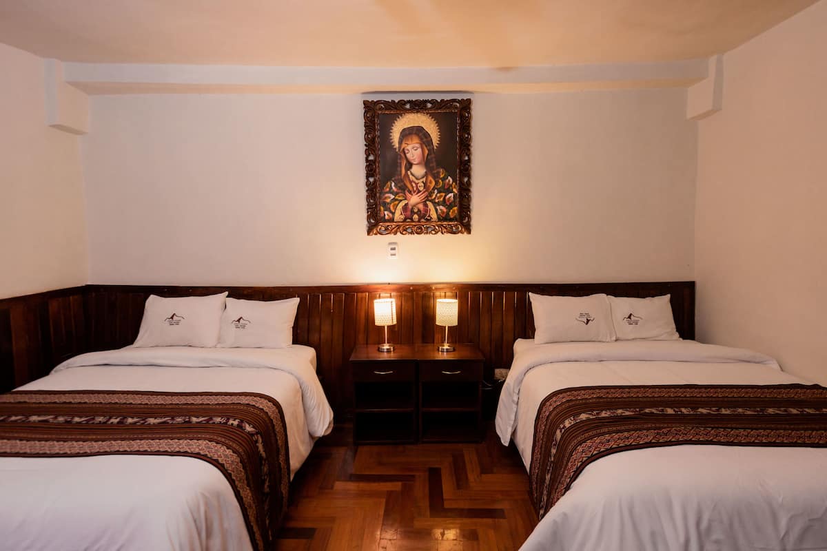 Chambre Deluxe double, 2 grands lits | Accès au Wi-Fi (inclus)