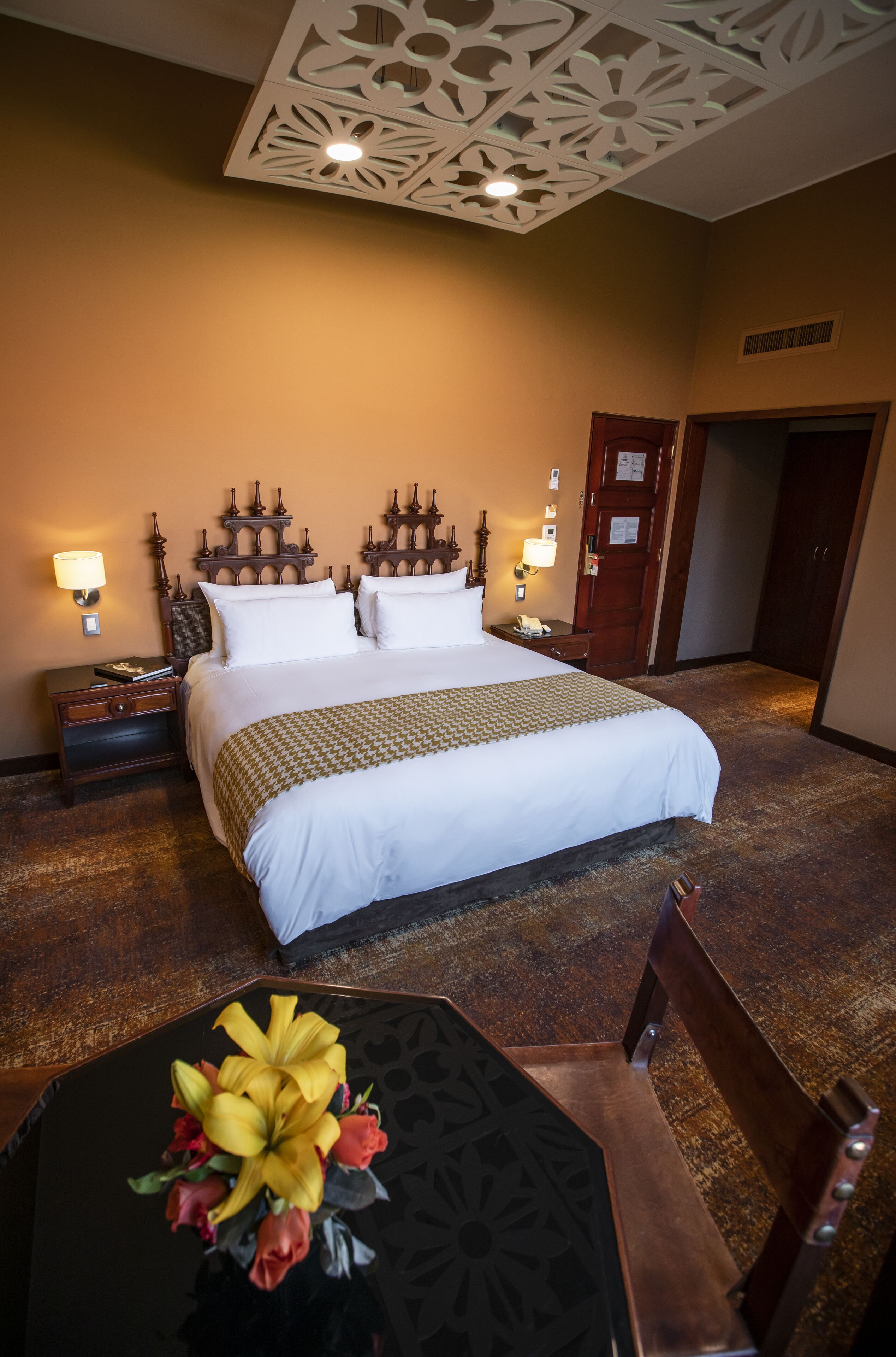 premier room, 1 king bed, non smoking, garden view | minibar, in-room safe, desk, laptop workspace