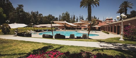 Outdoor pool, pool umbrellas, pool loungers