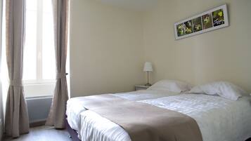 1 chambre, fer et planche Ă  repasser, Wi-Fi gratuit, draps fournis