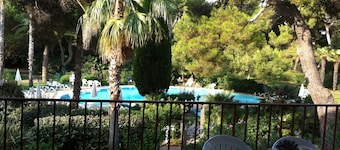 Feet in Giens water in a seaside garden