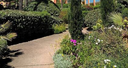 Feet in Giens water in a seaside garden