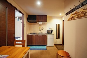 Standard Family Room | Private kitchen | Full-size fridge, microwave, stovetop, electric kettle - Ben's Guesthouse Kyoto (Kyoto)