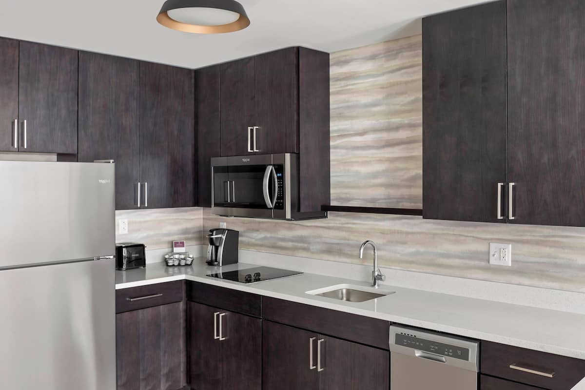 full-sized fridge, microwave, dishwasher, coffee/tea maker