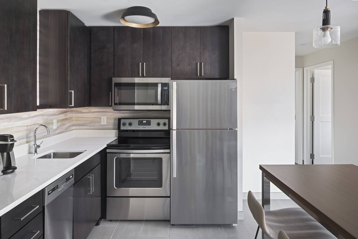 full-sized fridge, microwave, dishwasher, coffee/tea maker