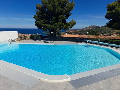 Air-conditioned villa, exceptional location in a private residence with pool