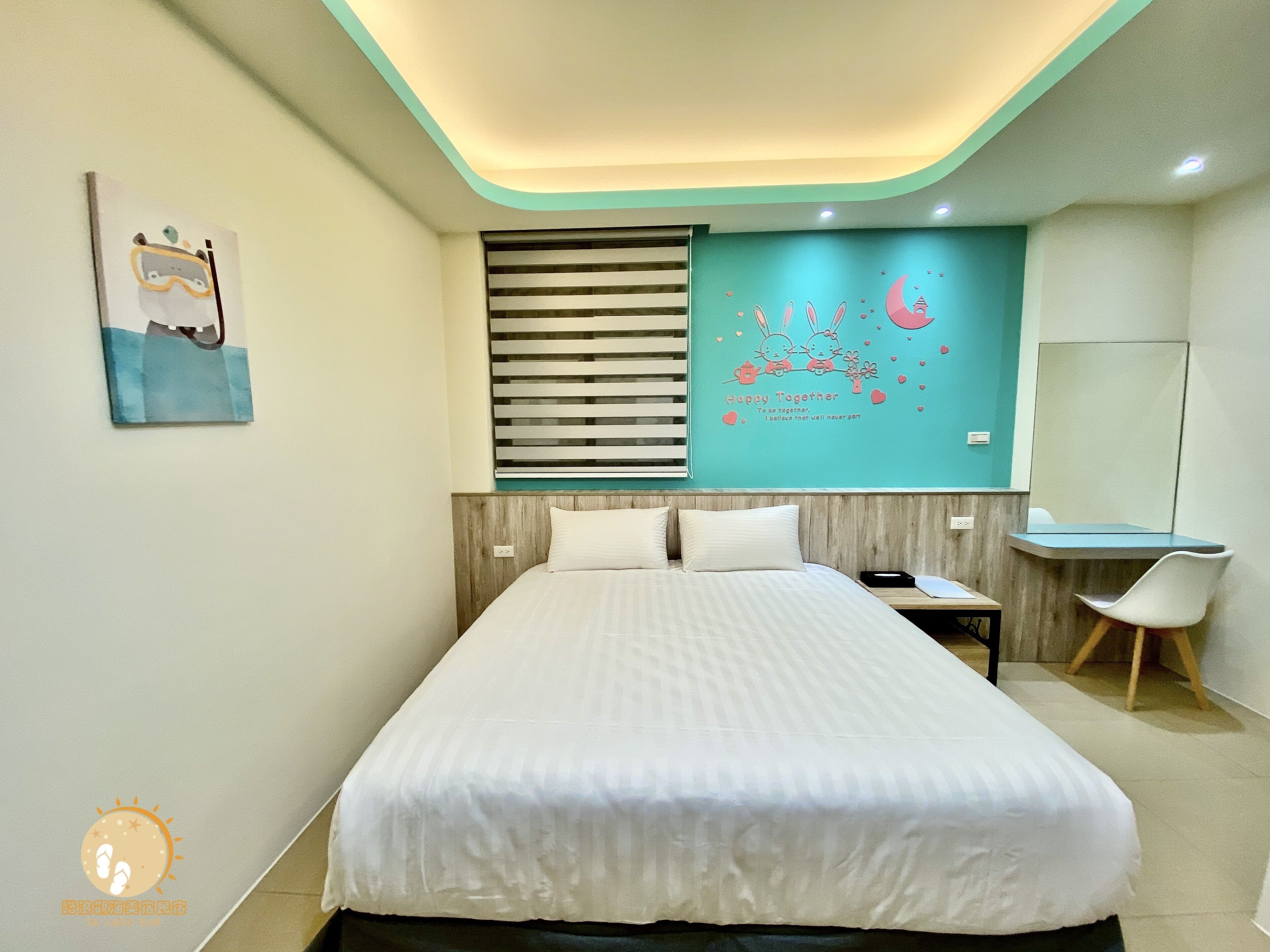 A modern bedroom with a large bed, a bedside table, a chair, and a wall with a mural.