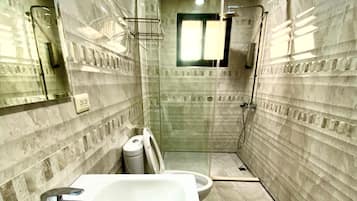 Shower, free toiletries, hair dryer, slippers