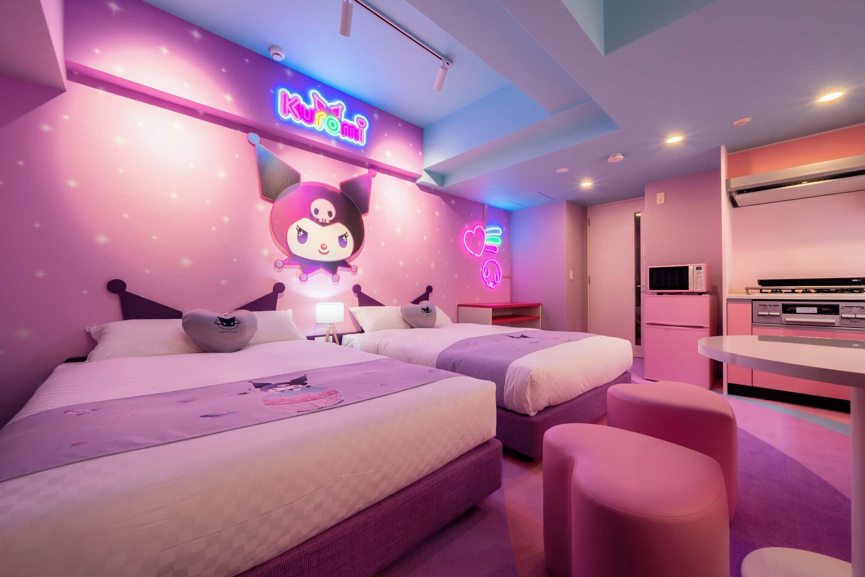 A modern hotel room with two beds, a kitchenette, and a neon sign.