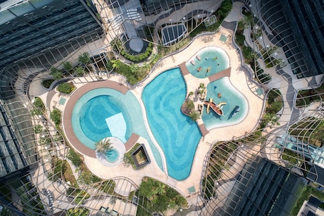 Seasonal outdoor pool, open 9:00 AM to 7:00 PM, lifeguards on site