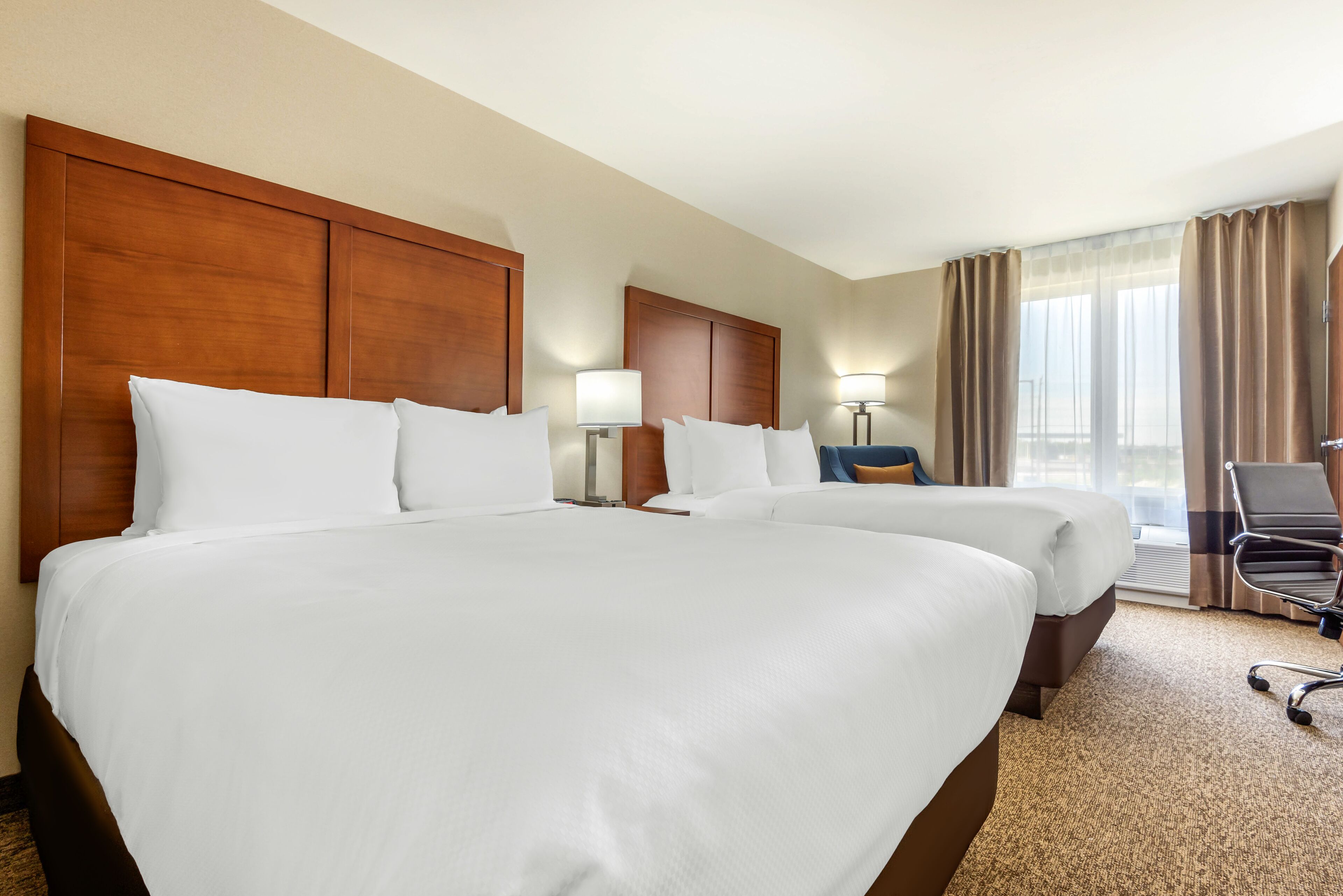 standard room, 2 queen beds, non smoking | premium bedding, down duvets, pillow-top beds, desk